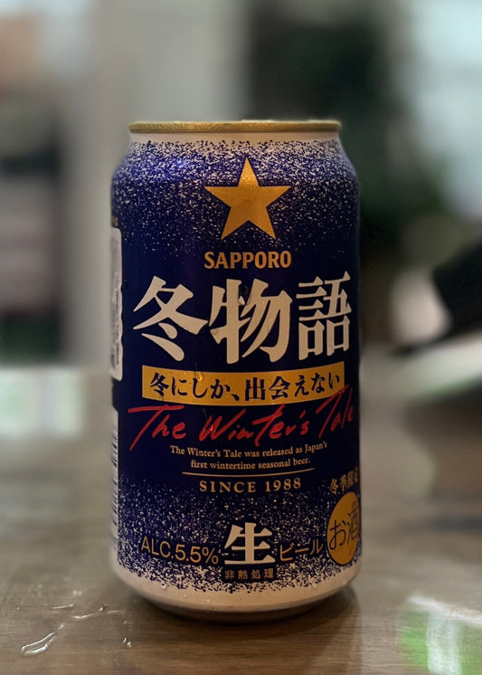 SAPPORO The Winter’s Tale beer can and glass, filled with crisp, golden lager and a frothy head. A seasonal winter special.